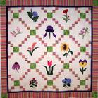 tulips sunflower iris flowers quilt free hand feathers