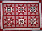 red green christmas quilt cutom quilting feathers